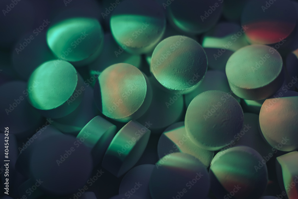 Poster pills or drugs in a package under neon light. beautiful background pattern for design.