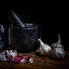 Pestle and mortar with garlic.