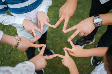 Family hands together fun time