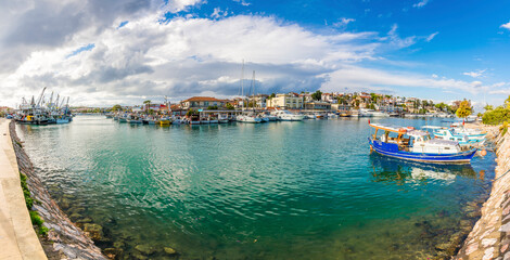 Fototapeta na wymiar Fishing boats view at Dalyan Village in Cesme Town of Izmir Province. Cesme is populer tourist destination in Turkey.