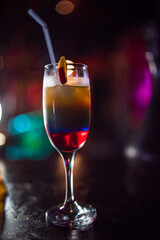 Alcoholic cocktail in a night bar close-up.