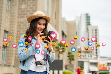 asian woman excited about getting attention on social media with mobile smartphone.woman having fun traveling again during corona virus(covid-2019) outbreak.