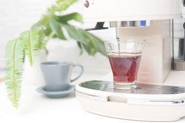 coffe maker in white background close up