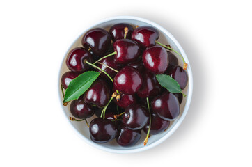 Red cherry. Ripe berries in a white plate. Isolated on white