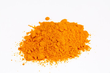Powder turmeric on white background