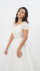 Beautiful sexy asian TAN SKIN woman in bride dress on white background.