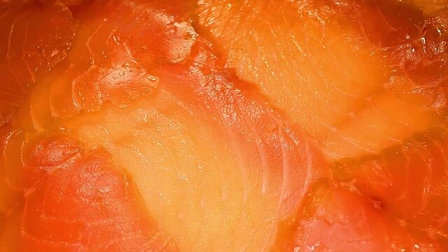 Salmon Smoked Salmon Fillet Slices on Rotating Plate. Fish Closeup