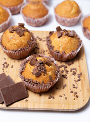 sweet muffins with pieces of chocolate in close-up