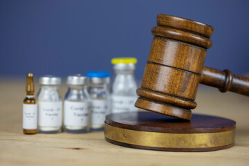 Gavel and different vaccines, Law and vaccination concept