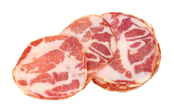 Capocollo or coppa traditional Italian dry cured pork meat slices isolated on a white background