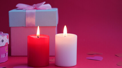Valentines day. Romantic layout with candles and gifts for valentine's day. Red and white candles