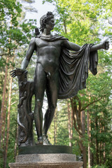 Fototapeta na wymiar Pavlovsky Park. Twelve roads. Bronze Greek gods.