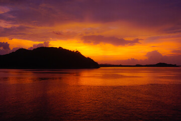 Naklejka na ściany i meble Incredibly beautiful sunset on the island of Lombok in Indonesia