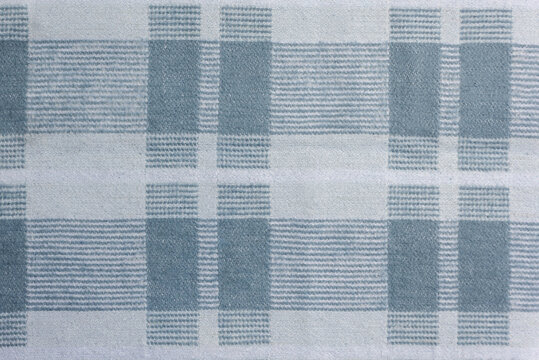texture of pastel-colored checkered fabric. cotton material background