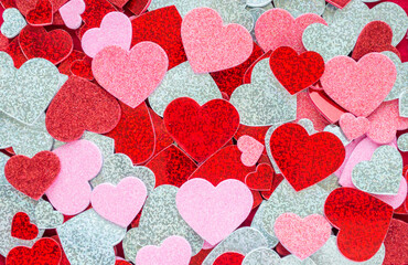 background texture-jumble of tiny festive sparkly hearts for Valentine's Day