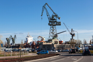 Fototapeta na wymiar Cranes in the shipyard of Gdansk, Poland.