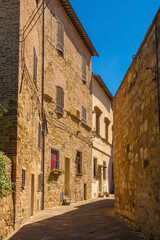 Fototapeta na wymiar A quiet residential road in the historic centre of the medieval town of Montepulciano in Siena Province, Tuscany, Italy 