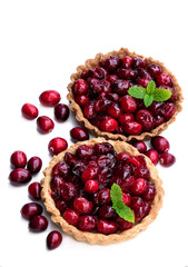 Delicious cranberry tarts isolated on white