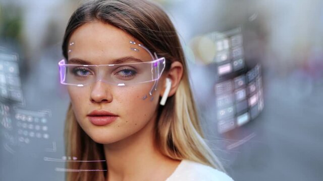 Young woman with AR glasses plunges into augmented virtual reality. Technological 3d Scanning. Biometric Facial Recognition. Future concept. Face ID. Futuristic information hologram