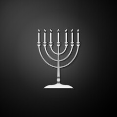Silver Hanukkah menorah icon isolated on black background. Religion icon. Hanukkah traditional symbol. Holiday religion, jewish festival of Lights. Long shadow style. Vector.