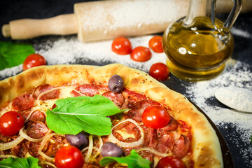 Traditional Brazilian pizza, vegetables, ingredients on a dark aged wooden background. Space for...