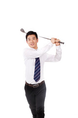 A happy young business man playing golf