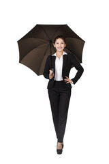 A young Business woman holding an umbrella