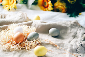 Fototapeta na wymiar Organic naturally dyed yellow and gray Easter eggs.