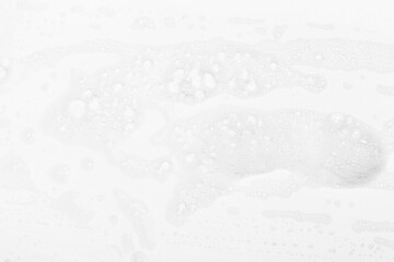 Abstract background white soapy foam texture. Shampoo foam with bubbles