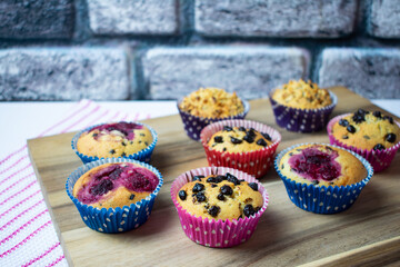 Delicious raspberry, hazelnut, chocolate muffins. Homemade fresh small cake.