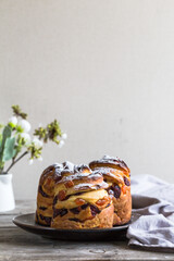 Panetone kulich craffin on wooden background. Easter bread kozunak. copy space concept.