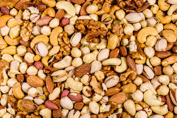 Background of the various nuts (almond, cashew, hazelnut, pistachio, walnut). Vegetarian meal. Healthy eating concept