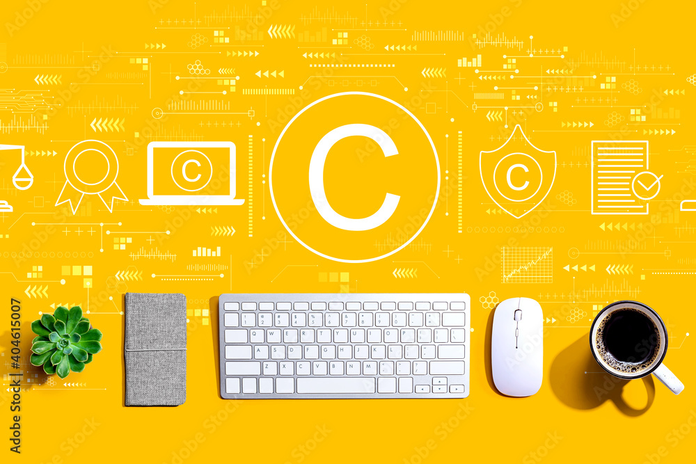 Poster copyright concept with a computer keyboard and a mouse