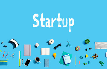 Startup with collection of electronic gadgets and office supplies