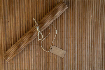 bamboo mat on wooden background