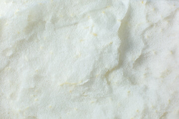 White peel texture inside grapefruit. Beige natural background.