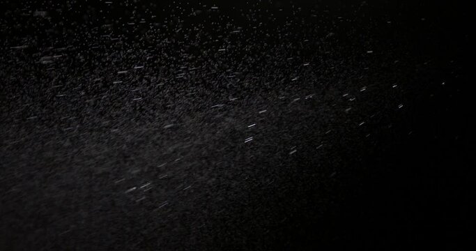 Water spray dust. Spraying mist effect of air gun isolated on black background