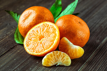 Fresh oranges on a wooden table