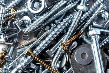 Mixed screws and nails. Industrial background. Home improvement.bolts and nuts.Close-up of various...