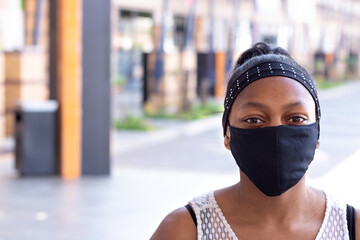 Black woman wearing protection mask