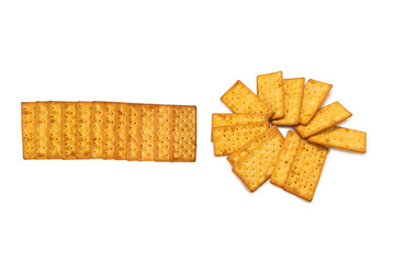 Cracker with salt isolated on white.