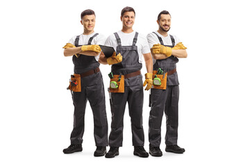 Team of repairmen in uniforms