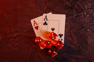 Online gambling theme. Aces and five red dices.