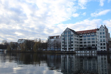 Berlin, Germany blue skies with reflection on the river