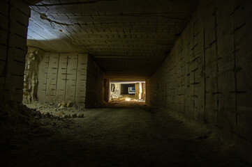 Fototapeta na wymiar Long tunnel through gypsum mine