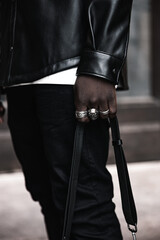Fashion black man walking on street. Fashionable portrait of african american male model. Street...