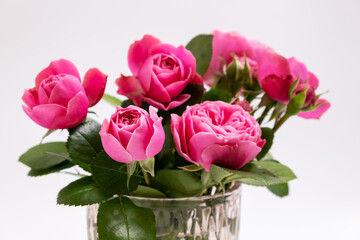 Pink rose flowers arrangement. Festive bouquet composition on white background. Birthday, Mother's, Valentines, Women's, Wedding Day concept. Copy space