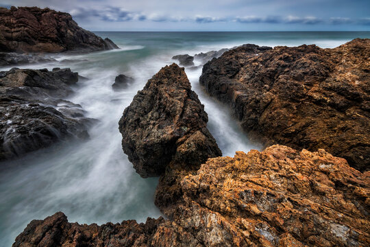 Water Pouring In Through The Rocks At Port Macquarie On NSW Mid North Coast