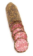 Log of Salami Coated in Herbs and Isolated on a White Background