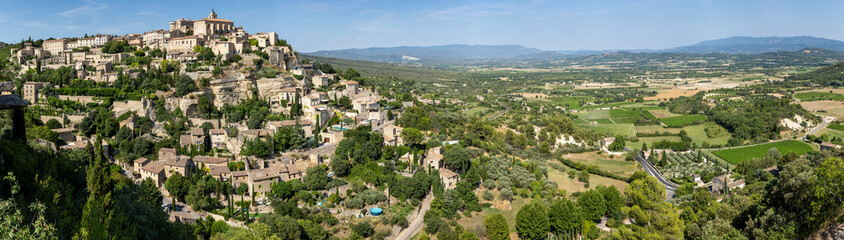 Panoramic view of the beautiful town of Gordes,a commune in the Vaucluse département in the Provence-Alpes-Côte d'Azur region in southeastern France - obrazy, fototapety, plakaty
